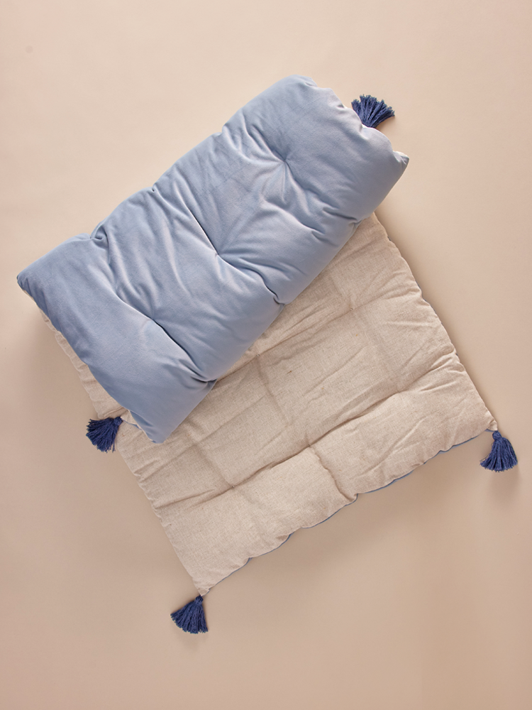 Bench cushion with decorative tassels