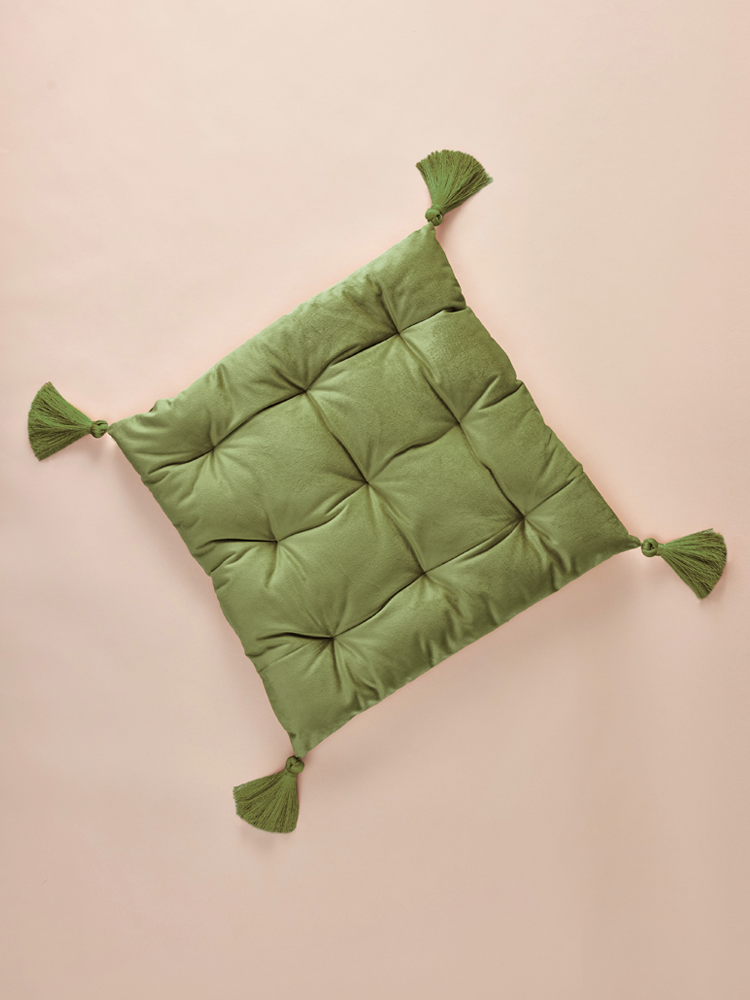 Square velvet pillow with decorative tassels
