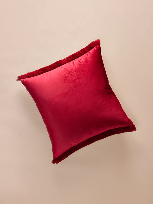 Velvet patterned pillowcase with small fringe.